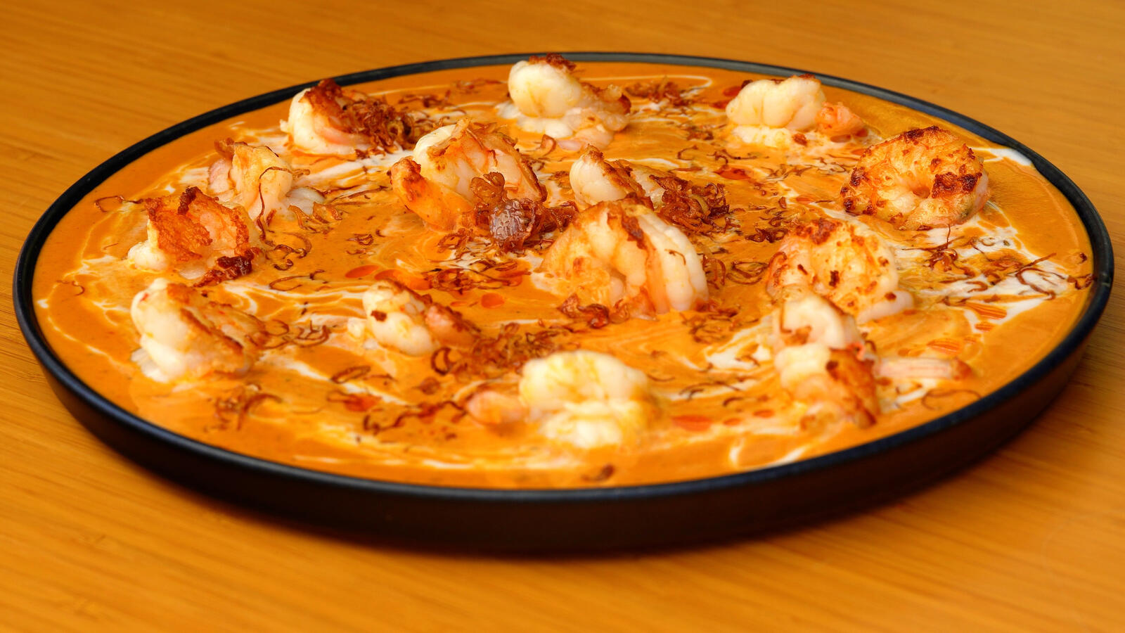 A stunning king prawn panang curry made from scratch using homegrown lemongrass and kaffir lime leaves for a client in Quinta do Lago who requested the best Thai curry outside of Thailand from Algarve private chef Adam Hollingsworth.